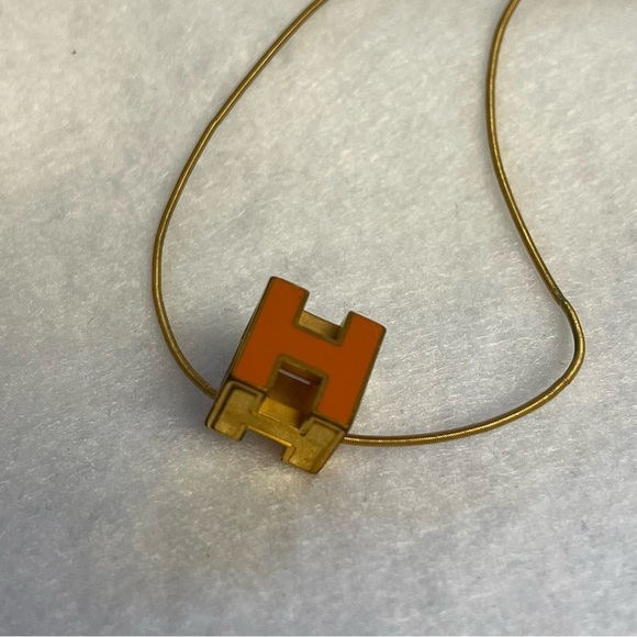Hermes Jewelry - HERMES H CUBE Necklace Gold Tone Orange Enamel Short Chain